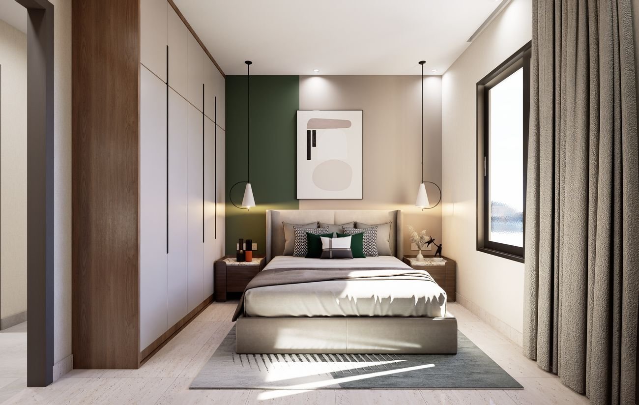 Master bedroom of a 3 BHK apartment with fitted wardrobes and a window