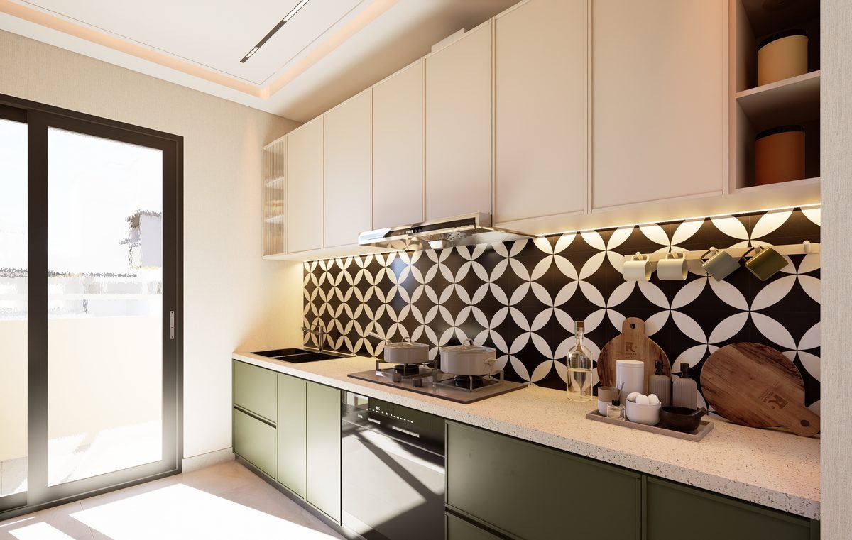 Kitchen of a 3 BHK apartment with a patterned splashback and a door to the wash area